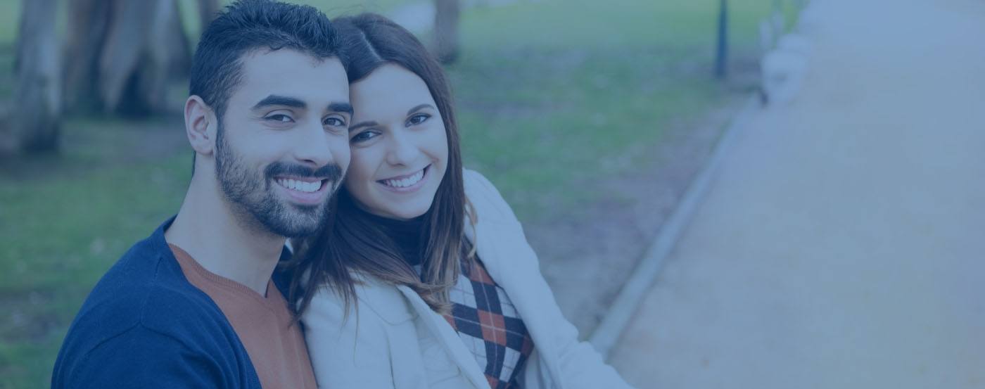 Man and woman smiling after visiting their Webster dentist