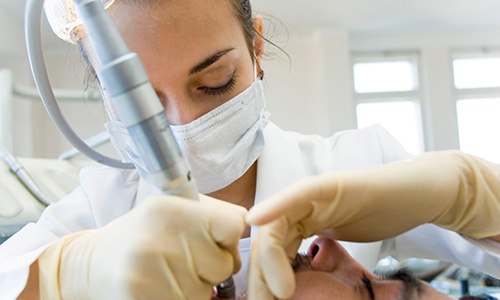 Webster dentist treating a patient with cavity 